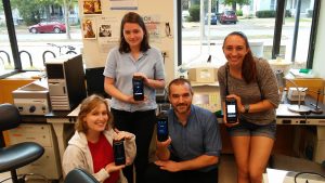 Dr. Ragland and Oberlin College students pose with the Biomeme two3.