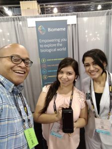 Study authors Jhomary Alegria-Berrocal (center) and Mona Alhalal (right) posing with the Biomeme two3 alongside Biomeme staff member Doug Watts (left) at the The American Society for Cell Biology Meeting 2017.