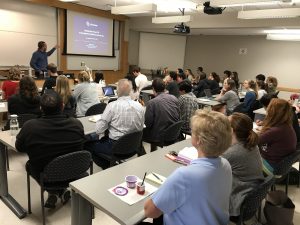 Ryan Ragland Ph.D. speaking to faculty and students.