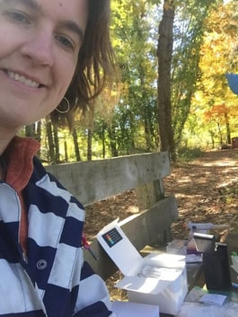 Dr. Amy Prunuske using Biomeme sample extraction kit in the field.